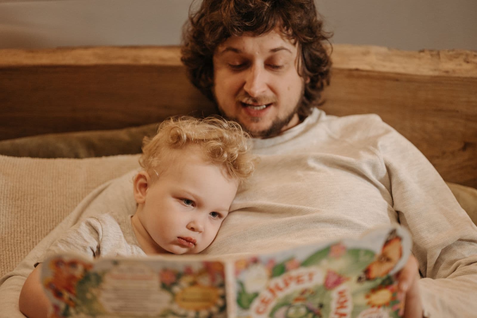 A father reading a bedtime story to his child
